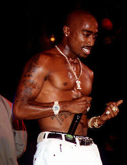 Tupac performing on stage