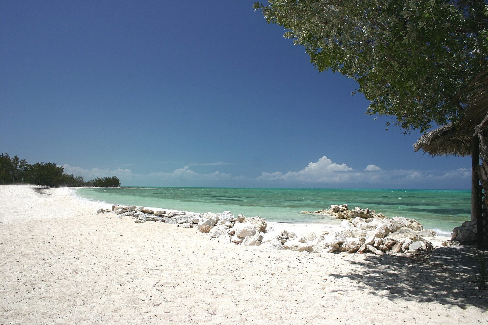 White sand beach and shallow turquoise water at Small Hope Bay, Andros