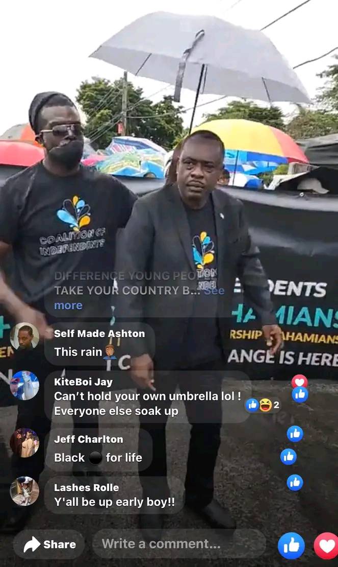 So the Rt. Hon. Lincoln Bean can't have a umbrella person?
Stop hating & get your own umbrella department personnel...