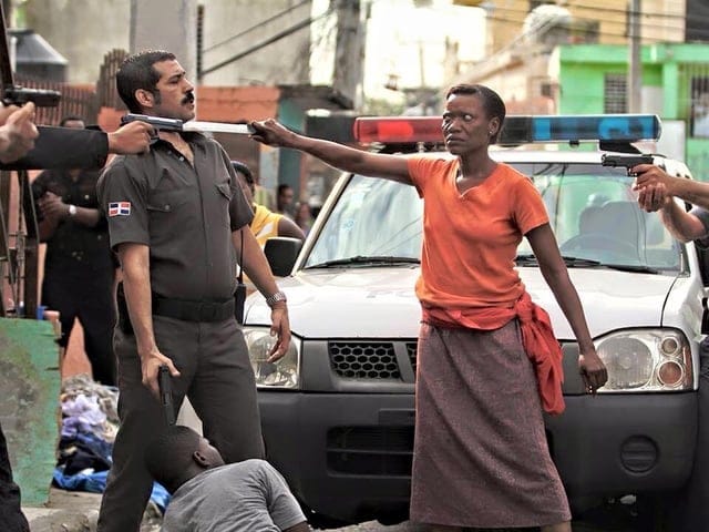 Powerful picture of a Haitian mother protecting her son.