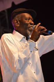 Bahama Drama News
Remembering Elon "Da Crab Man" Moxey
The Bahamas has lost a true cultural gem with the passing of Elon "Da Crab Man" Moxey, a beloved entertainer who dedicated