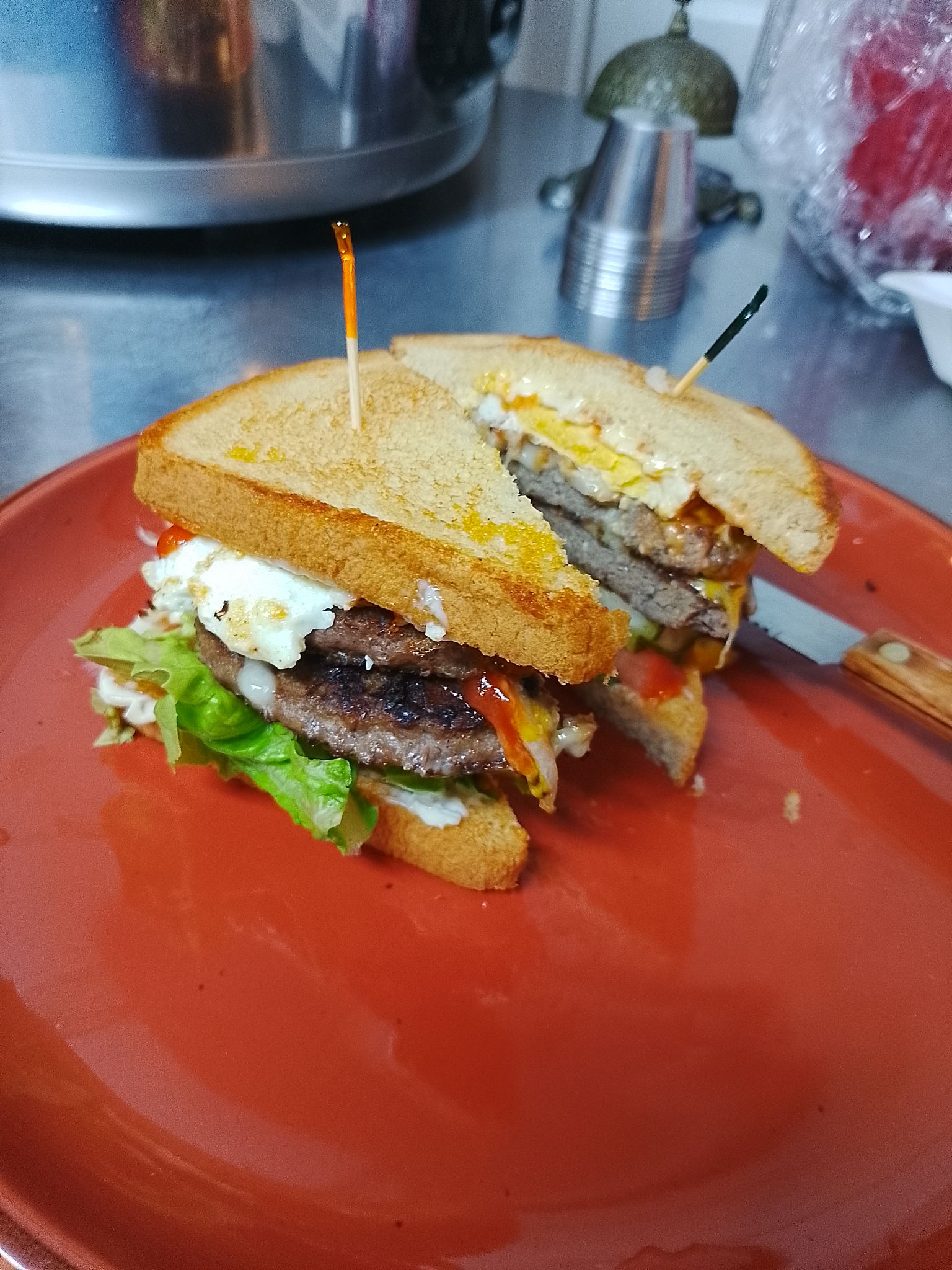 "For just $8.00, you can get this burger and homemade fries only in Exuma! It’s loaded with eggs, fried onions, lettuce, tomato, ketchup, mustard, and your choice of Swiss or Ameri